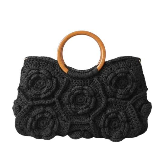 حقيبة يد كروشية باللون الأسود مطرزة بالزهور